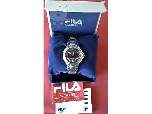 PoulaTo: Ρολόι χειρός FILA Traveller
